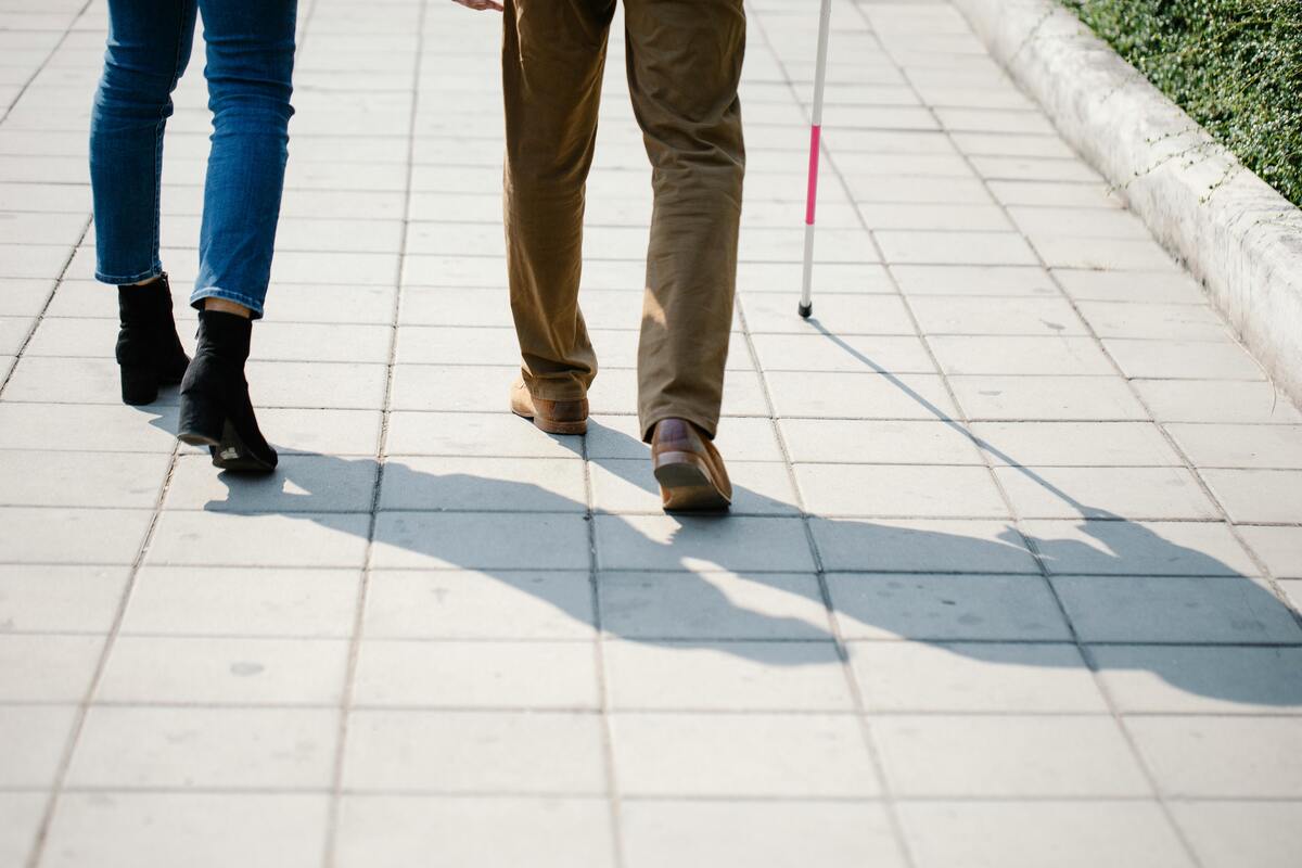legs moving and a walking stick, gait speed test